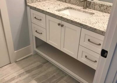 White bathroom cabinet by DRW Cabinets