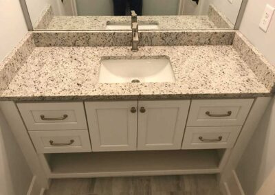 Bathroom cabinet and countertop by DRW Cabinets